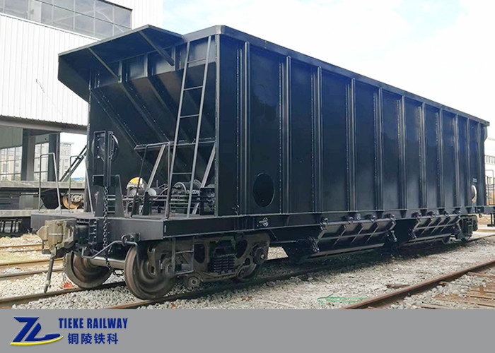1435mm Τεχνικός διάμετρος 90 τόνων Πληρωμή φορτίου Γρήγορη εκφόρτωση Hopper βαγόνια για ορυκτό μετάλλιο